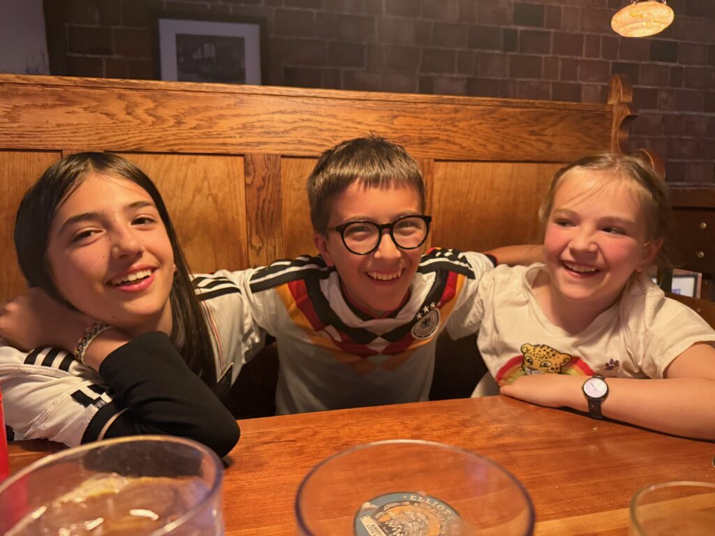 three kids in restaurant